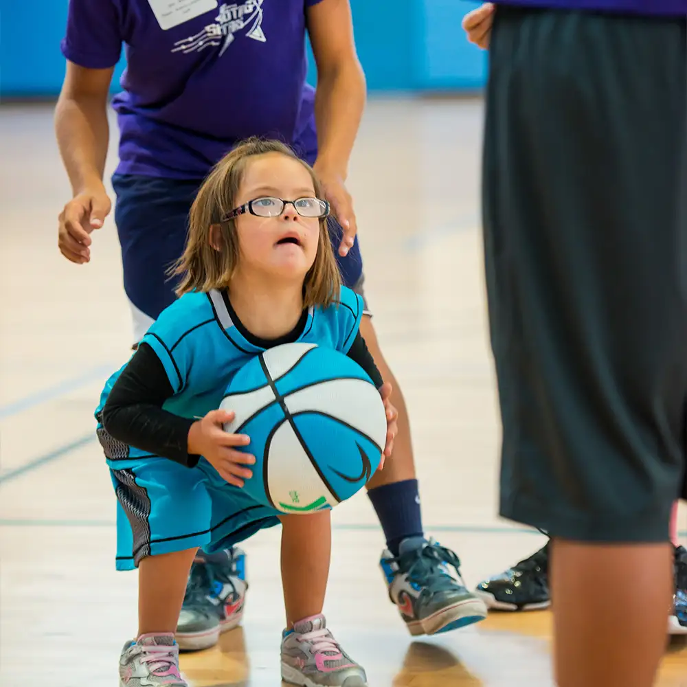 image of participant playing basketball