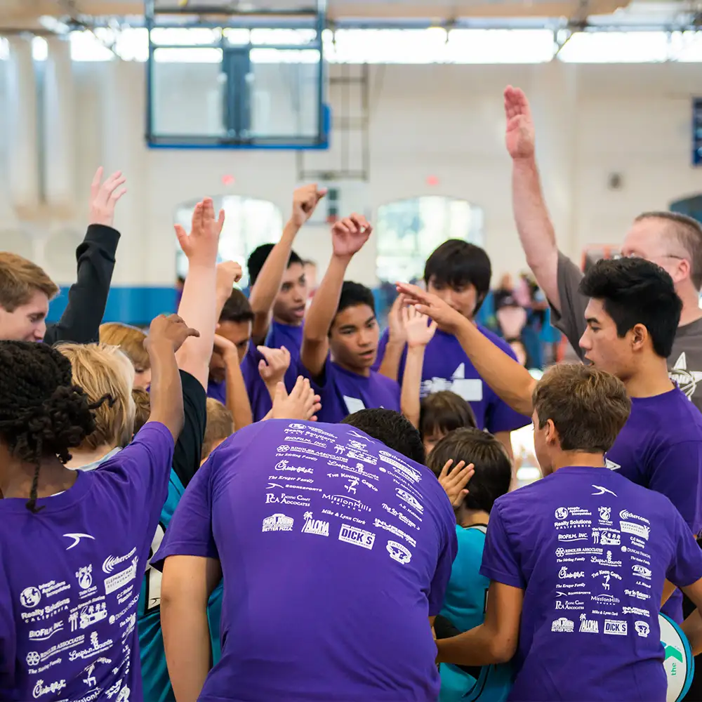 image of basketball buddies in huddle